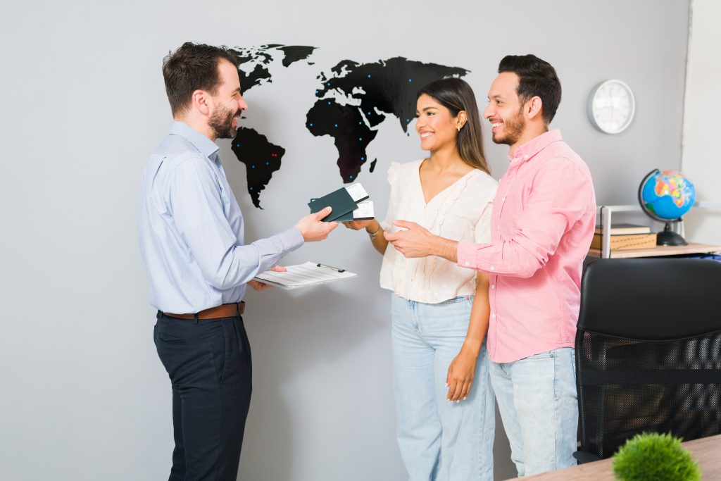 Excited couple receiving all they need for their vacations - Silk Road Elite - Silk Road Elite Excited couple receiving all they need for their vacations