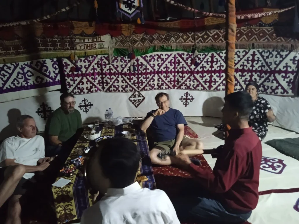 Traditional music with travelers inside a yurt in Uzbekistan