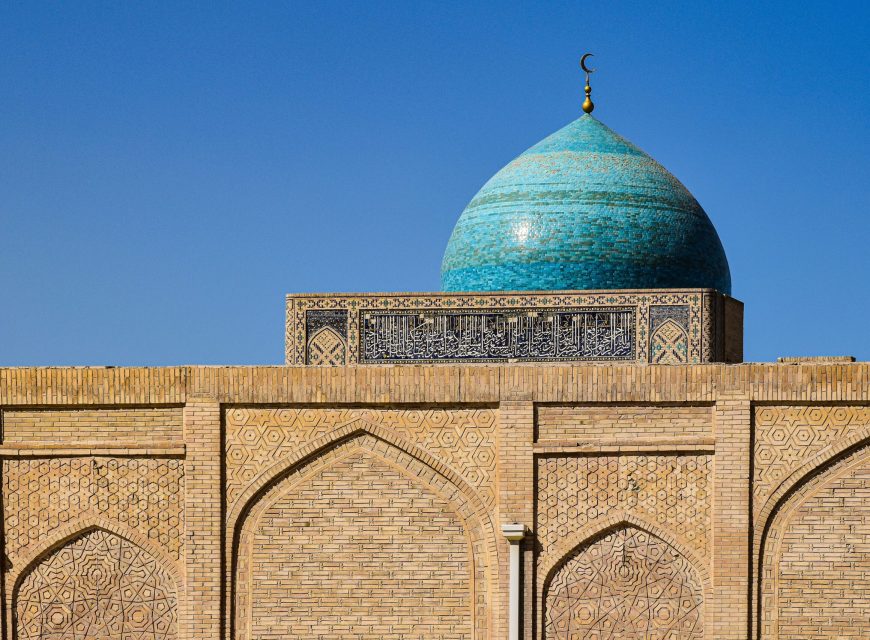 Turquoise tiled dome of a historic Islamic building