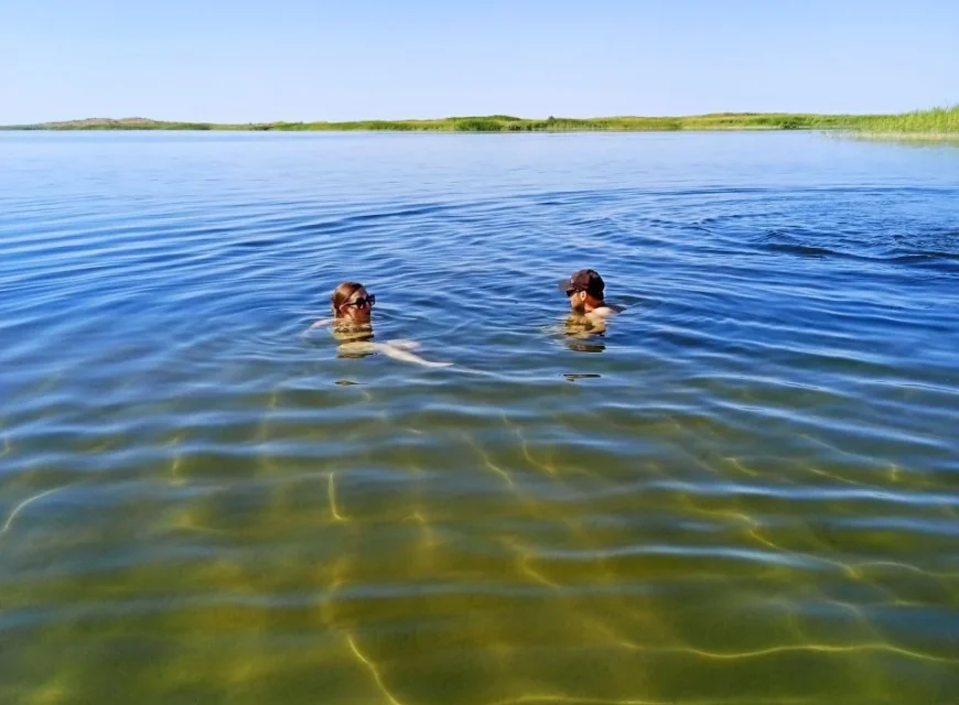Swimming in Aydarkul Lake, Uzbekistan