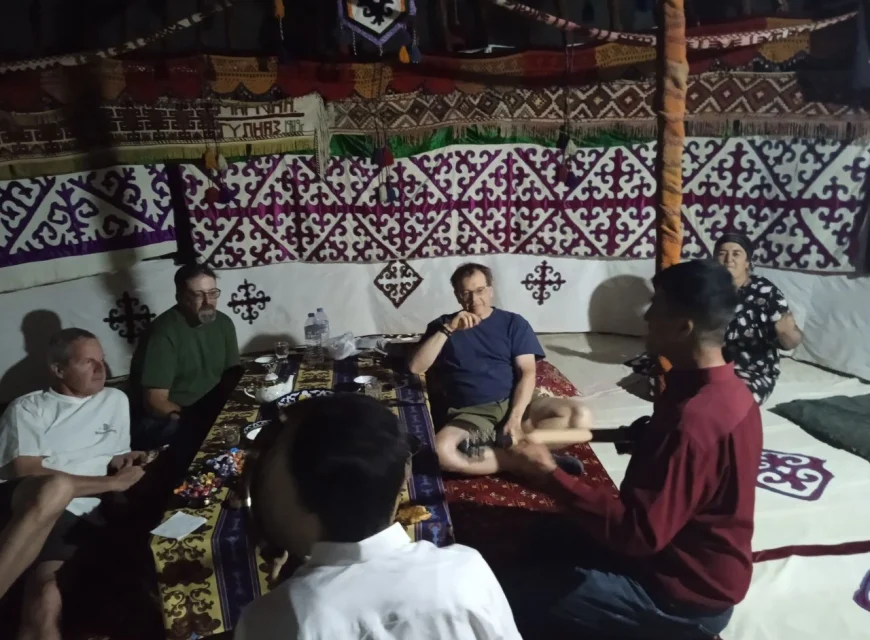 Traditional music with travelers inside a yurt in Uzbekistan